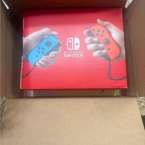 Nintendo Switch Console with Vibrant Blue and Red Controllers